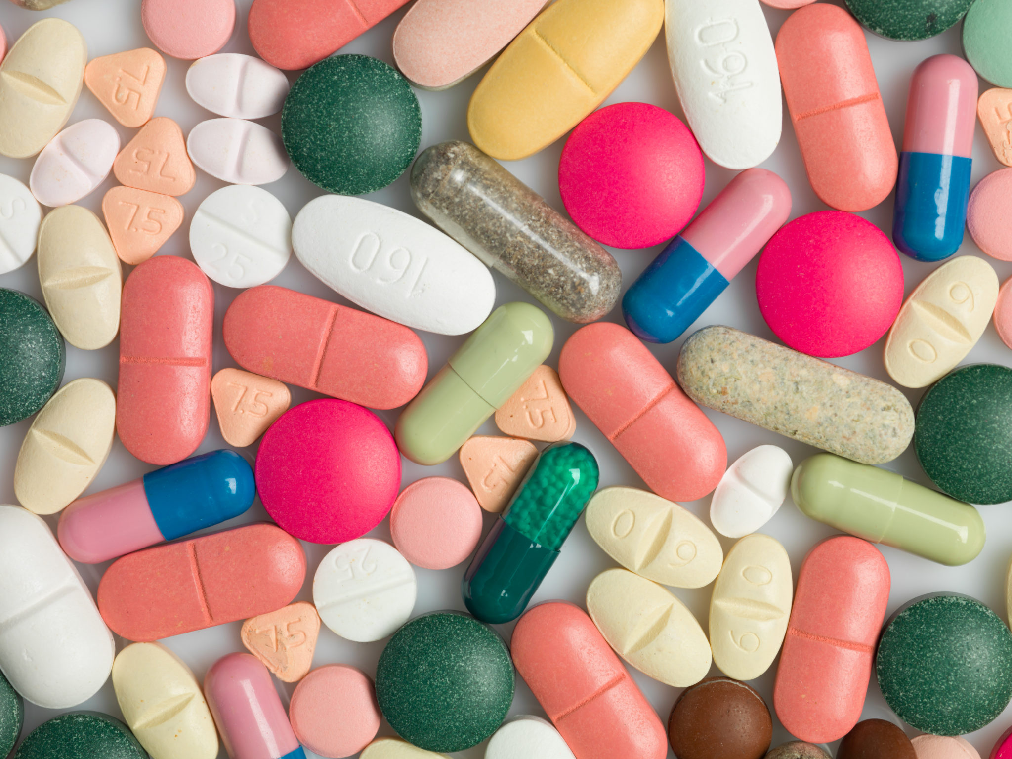 Как называется разноцветные таблетки. Разноцветные таблетки. Розовые таблетки. Драже лекарственная форма. Лекарственные формы картинки.